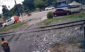 Biker Killed by Train