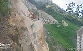 Excavator Plunges into Abyss