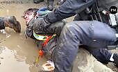 Police Tackle Agitators into Mud
