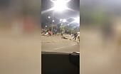 Man Run Over by Car During Street Fight