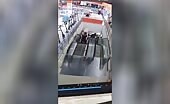 TV Smashed on Escalator