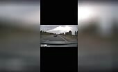 Driver Collides with Oncoming Truck