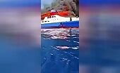 Woman Watches as Parents Burn in Ship Fire