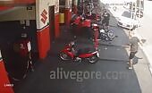 Biker Crashes into 2 Men Fixing Scooter