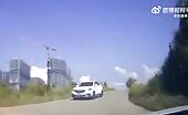 Car Crashes, Flies into Air