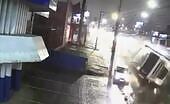 Truck Overturns, Nearly Crushes Car