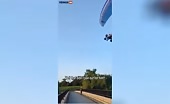 Paraglider Hits Power Line, Crashes into River