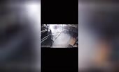 Truck Mounts Sidewalk, Kills Motorcyclist
