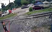 Train Hits Scooter Rider