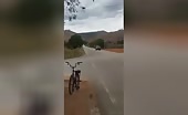 Biker Hit by Vehicle