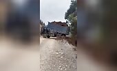 Truck Driver Falls Off Cliff