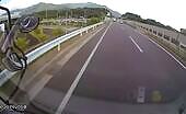 Truck Crashes Into Car, Falls on Road Worker