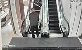 Table Transported Down Escalator
