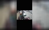 Two Adults On A Bike Lose Control Doing A Wheelie