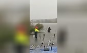Two Idiots Fishing During Thunderstorm