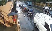 Red Umbrella Woman Dies in Mysterious Accident