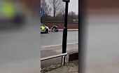 Man in wheelchair hit by police car