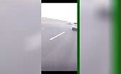 Car Drives Normally Through Dense Fog