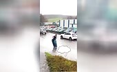 Man Avoids Getting Wet By Jumping Into Pool